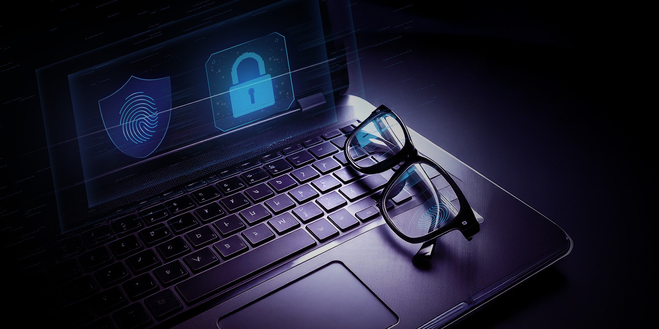 Laptop com proteção contra golpes, no monitor um ícone de digital e cadeado
